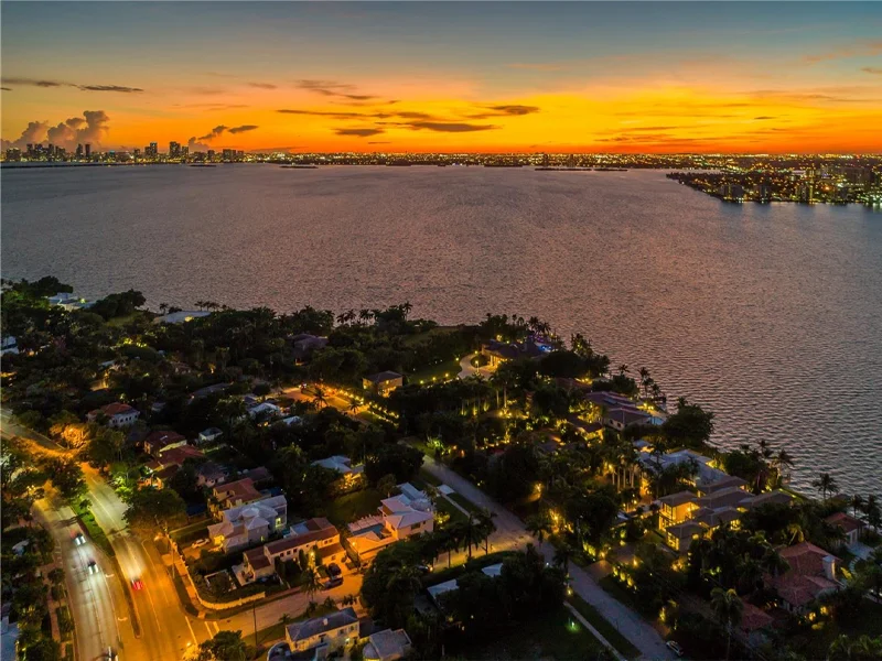 North Bay Road Miami Beach luxury waterfront estates at sunset with Biscayne Bay views and downtown Miami skyline