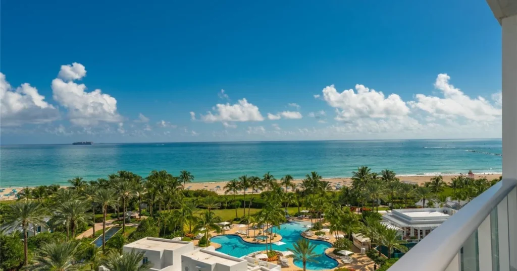 Image of Continuum South Beach Oceanfront Condominiums Tropical Pool Area with Panoramic Miami Beach Ocean View, a prime example of South Beach in Miami.