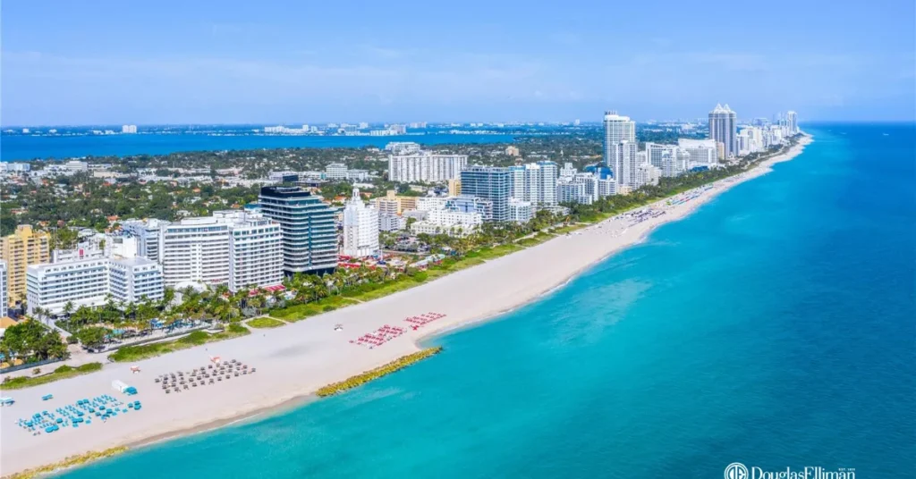 Aerial view of the iconic Faena District in Miami Beach, showcasing ultra-luxury oceanfront condos, modern architecture, and pristine white sand beaches along the Atlantic Ocean, perfect for upscale South Beach living.