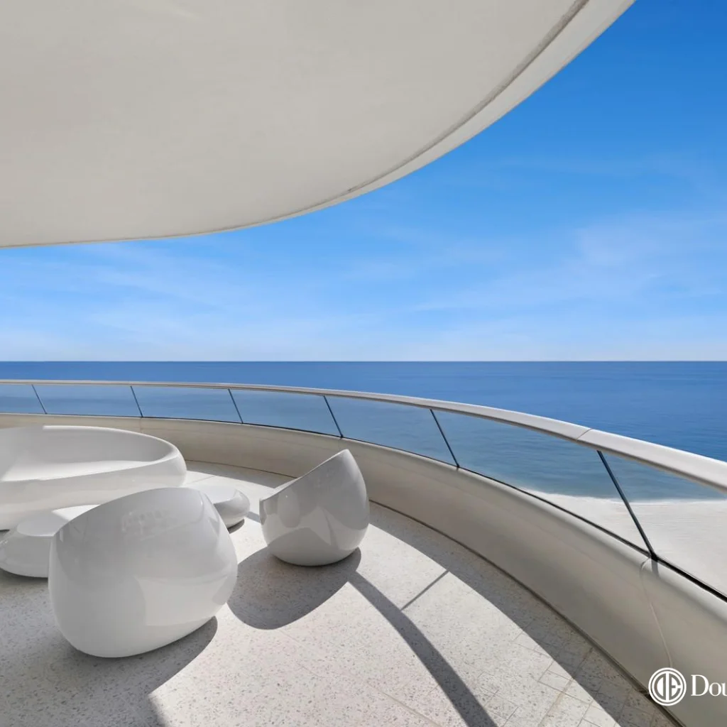 Image of Miami Beach Luxury Oceanfront Condo Balcony Direct Ocean Views, a prime example of Luxury Real Estate in Miami.