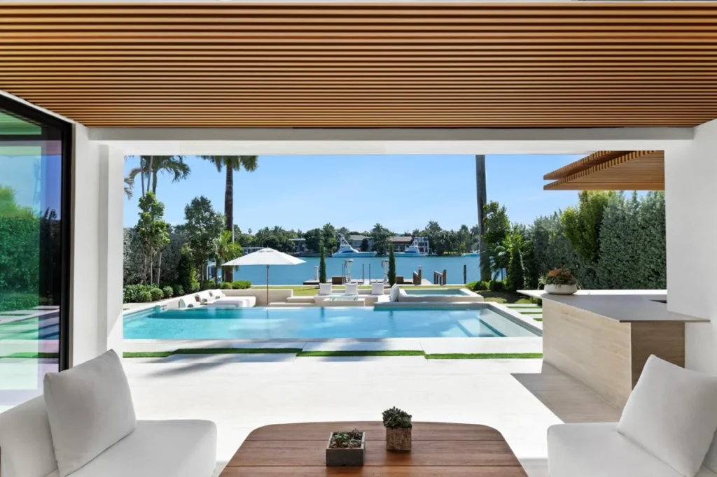 Detailed image of Miami Luxury Modern Waterfront Home Seamless Outdoor Living Infinity Pool Bay View Loggia, a premier Oceanfront Penthouse showcasing panoramic ocean views in the exclusive SoFi neighborhood.