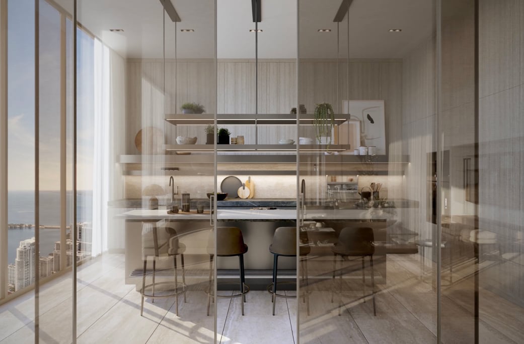 1428 Brickell residence with floor-to-ceiling glass doors opening to private terrace overlooking Biscayne Bay