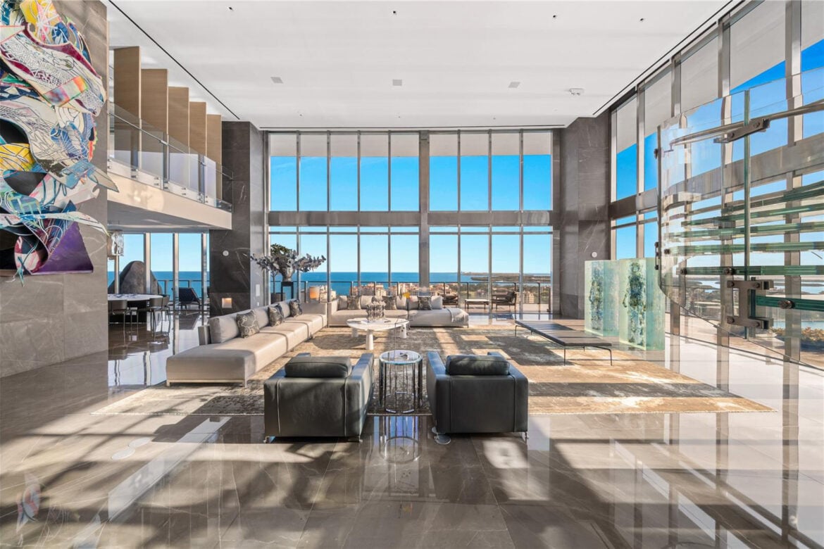 Apogee Penthouse interior South Beach Miami double-height ceilings ocean views glass staircase