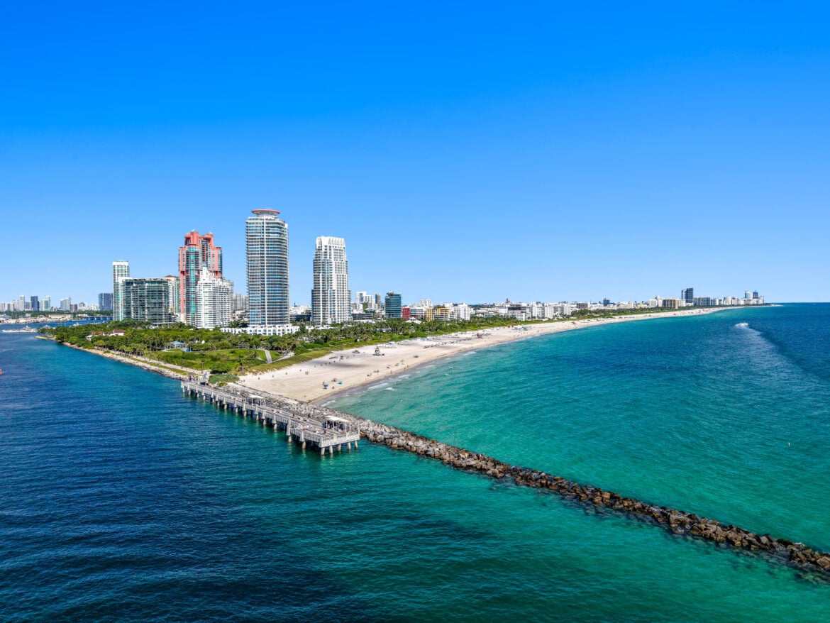 Aerial drone view of Continuum South Beach oceanfront condos — South of Fifth neighborhood, 50 and 100 South Pointe Drive, Miami Beach Florida