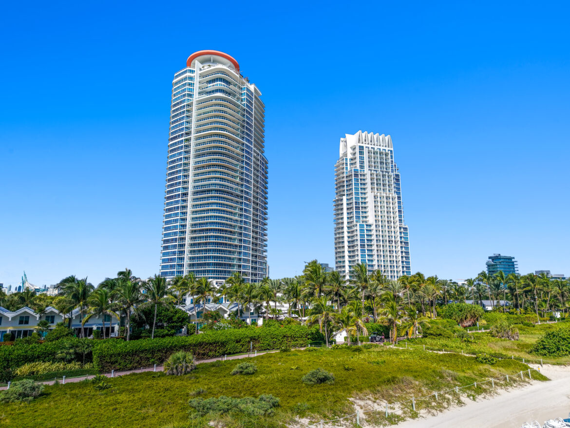 Wide aerial drone view of Continuum South Beach and South of Fifth neighborhood — luxury real estate at the tip of Miami Beach