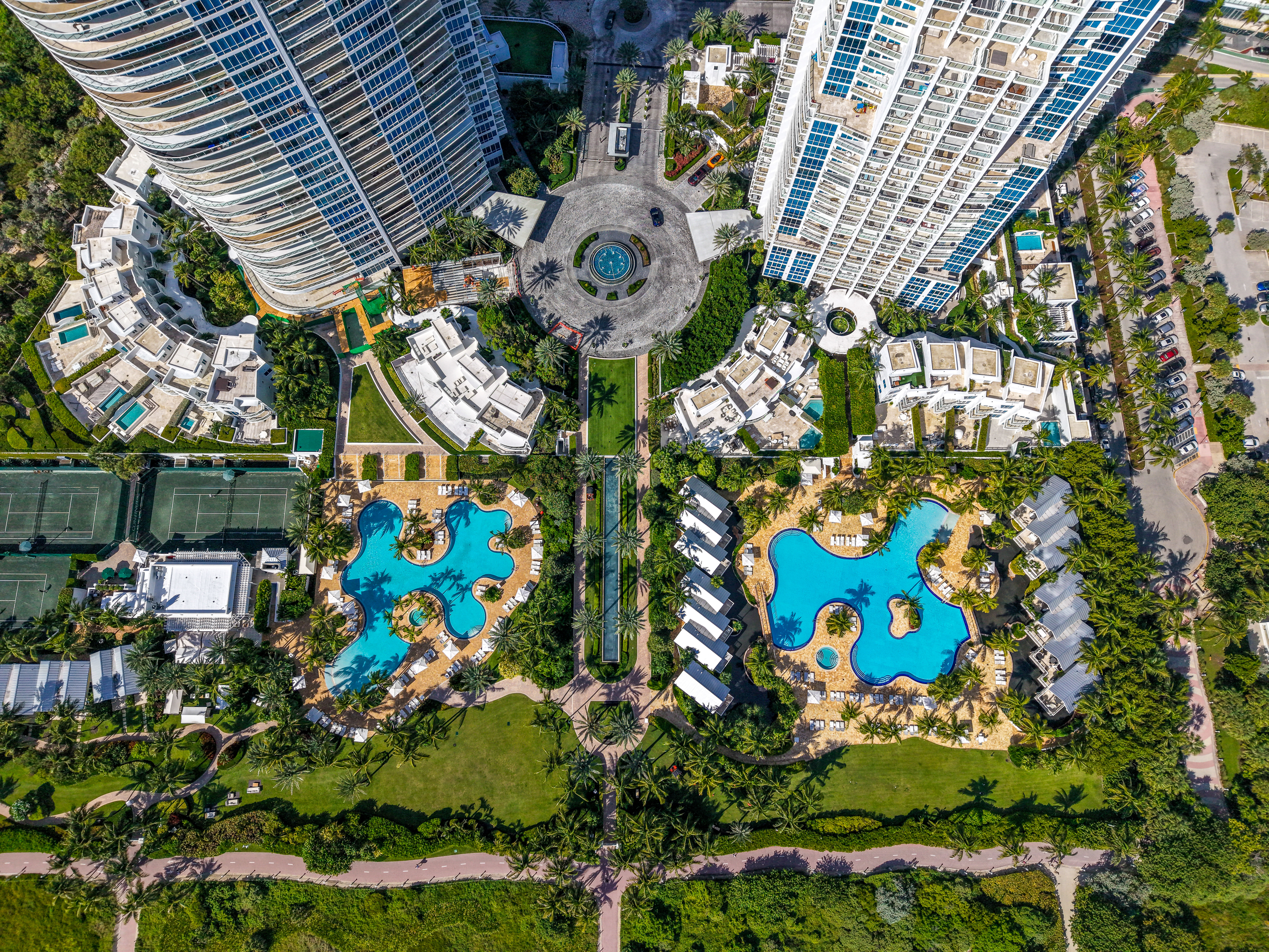 Aerial view of Continuum South Beach resort pool and twin towers — North and South Tower at 50 and 100 South Pointe Drive Miami Beach