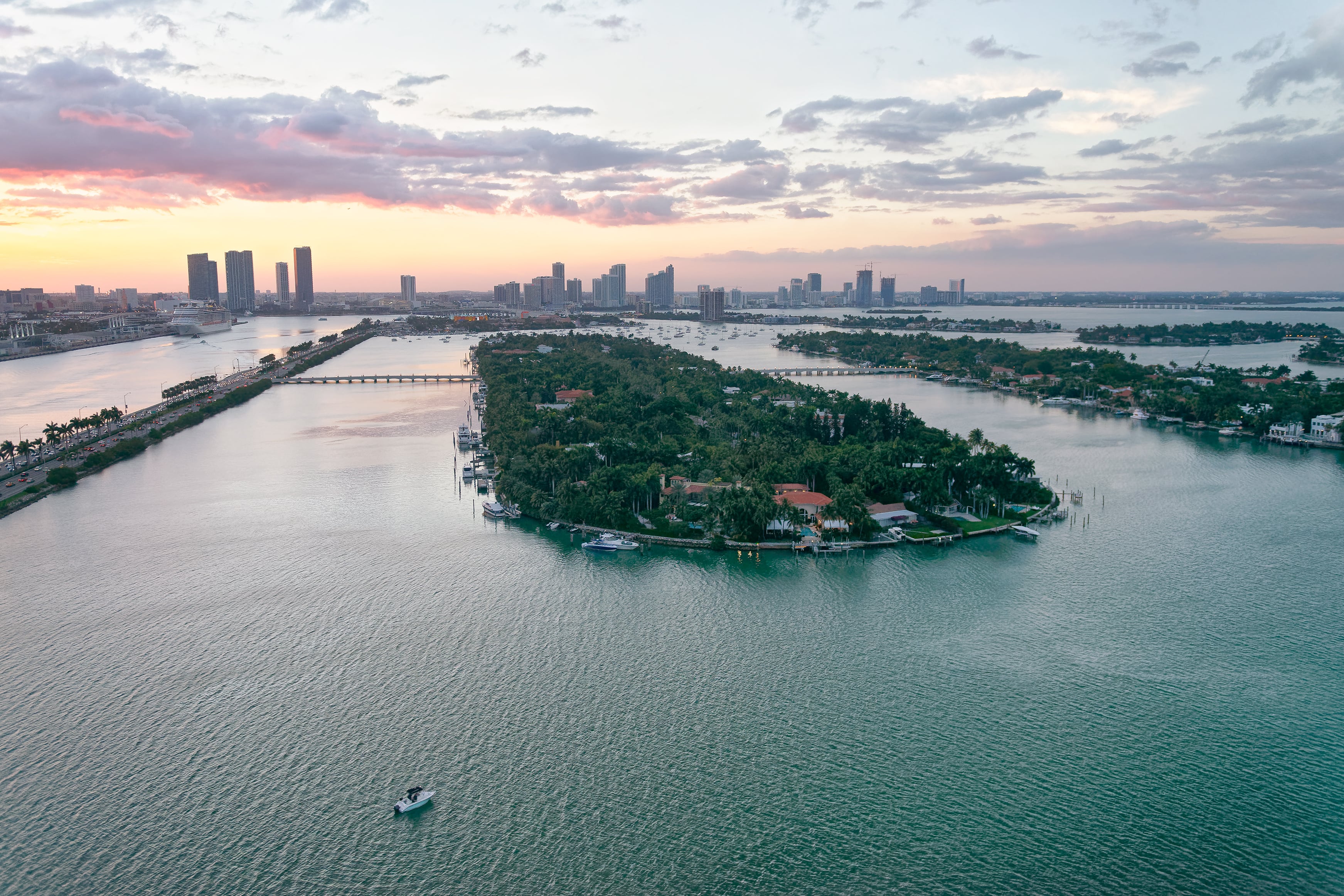 Aerial view of Palm Island and Hibiscus Island gated communities in Miami with luxury waterfront homes
